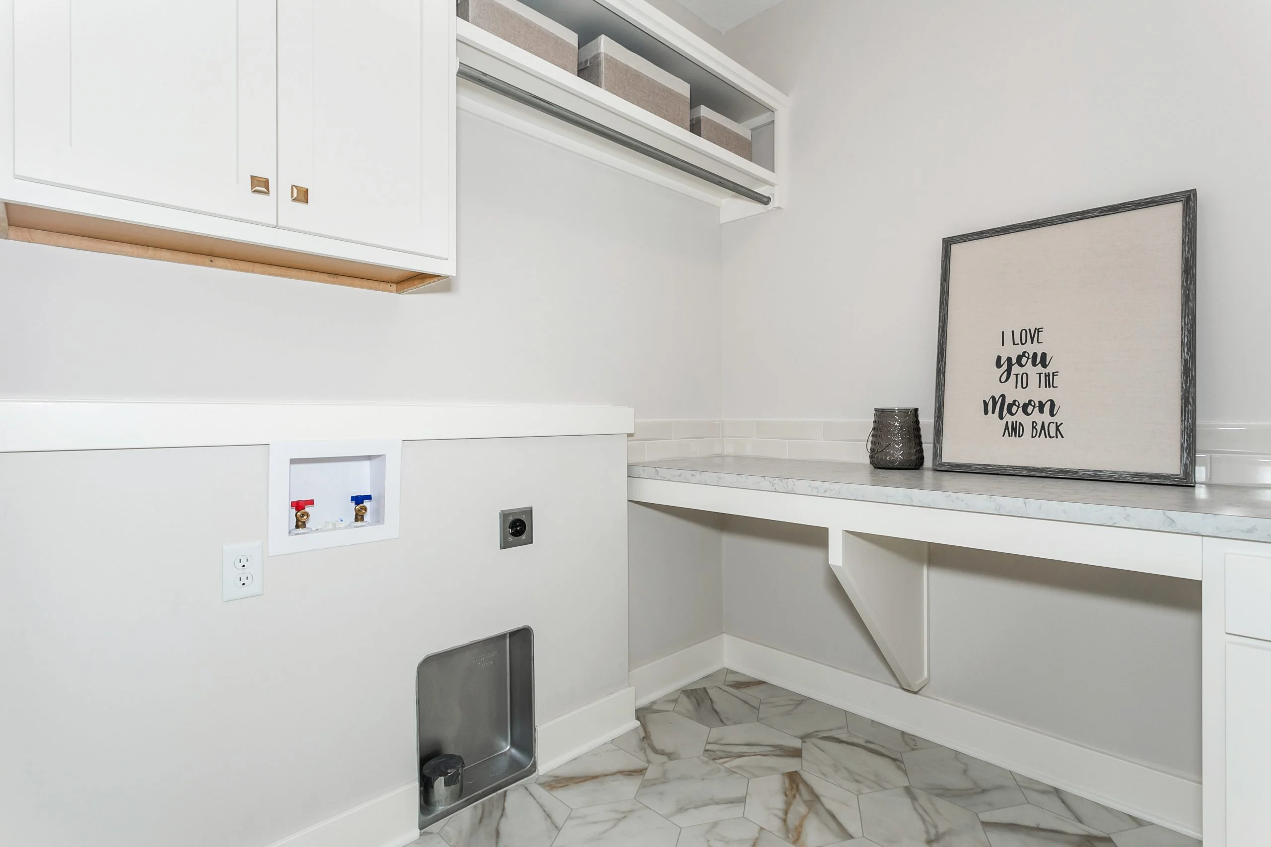 Laundry room with folding counter in a new home